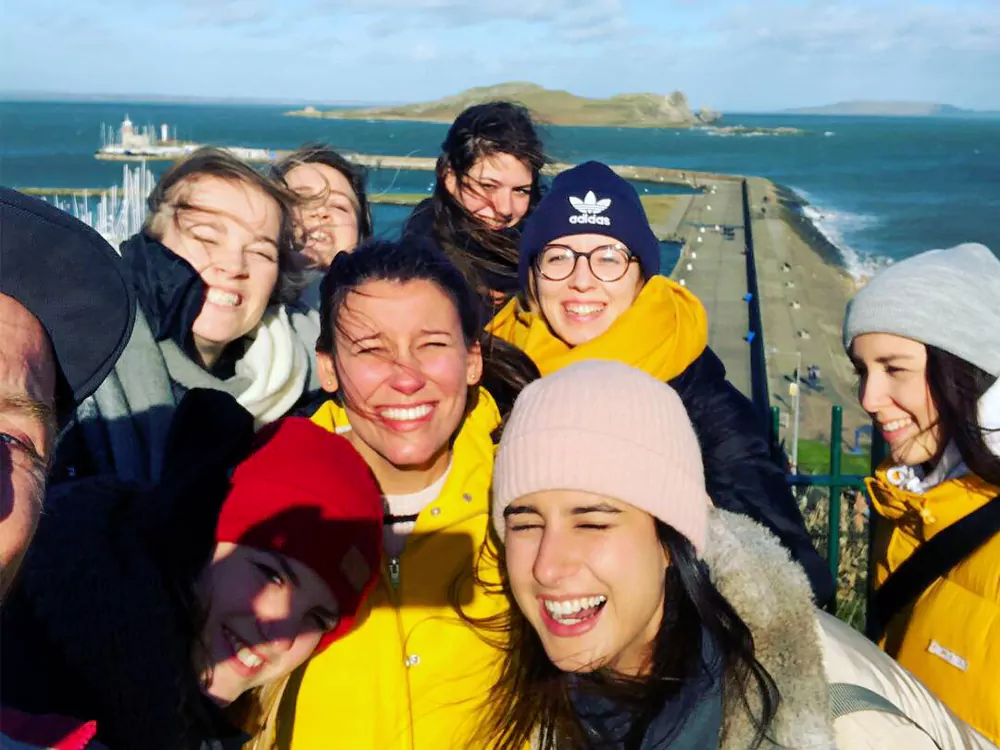 Spanish students at Howth Pier with Howth Hidden Experiences